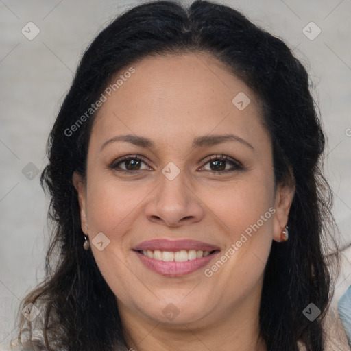 Joyful white adult female with long  brown hair and brown eyes