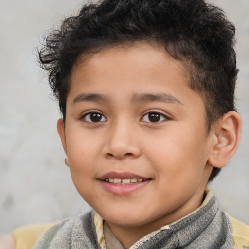 Joyful white child male with short  brown hair and brown eyes