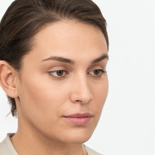 Neutral white young-adult female with short  brown hair and brown eyes