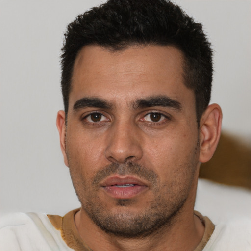 Neutral white young-adult male with short  black hair and brown eyes