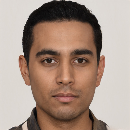 Neutral latino young-adult male with short  black hair and brown eyes