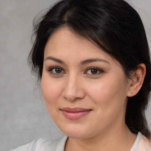 Joyful white young-adult female with medium  brown hair and brown eyes