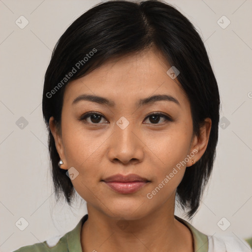 Joyful asian young-adult female with medium  black hair and brown eyes