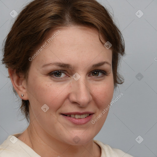 Joyful white adult female with medium  brown hair and brown eyes