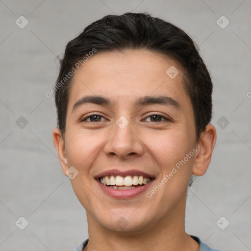 Joyful white young-adult male with short  brown hair and brown eyes