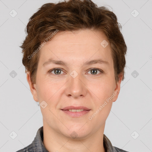 Joyful white adult female with short  brown hair and brown eyes