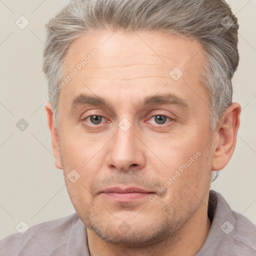 Neutral white adult male with short  brown hair and brown eyes