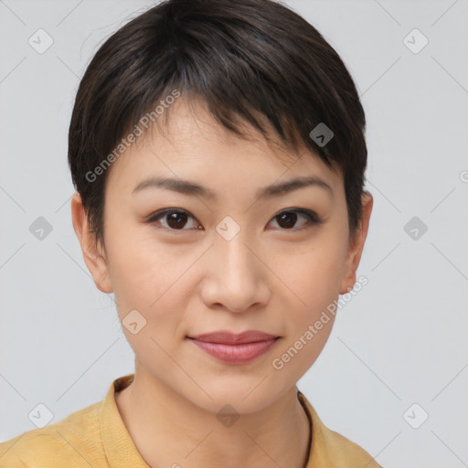 Joyful asian young-adult female with short  brown hair and brown eyes