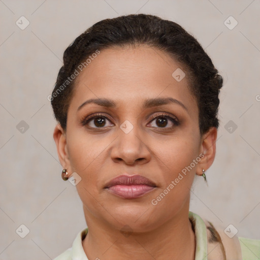 Joyful latino young-adult female with short  brown hair and brown eyes