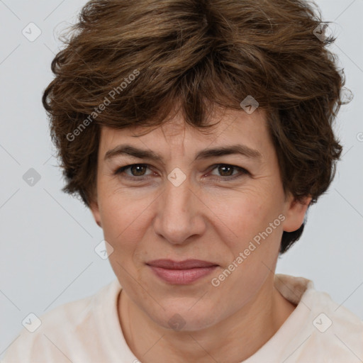 Joyful white adult female with short  brown hair and brown eyes