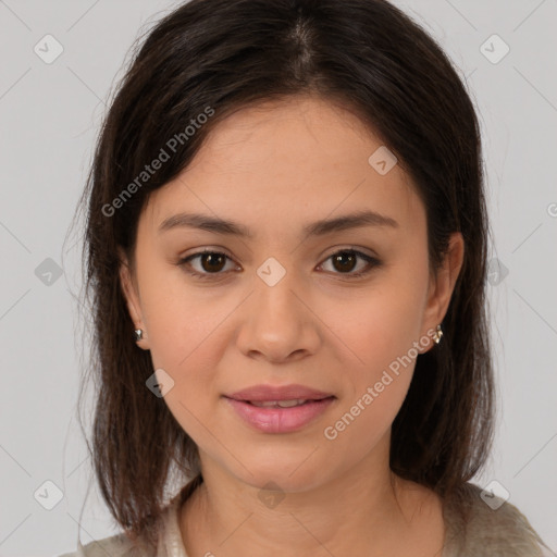 Joyful latino young-adult female with medium  brown hair and brown eyes