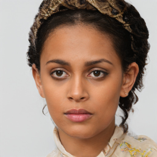 Neutral latino young-adult female with medium  brown hair and brown eyes