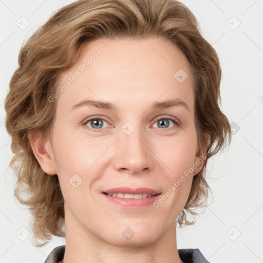 Joyful white young-adult female with medium  brown hair and blue eyes