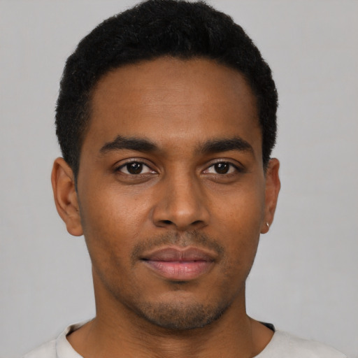 Neutral black young-adult male with short  black hair and brown eyes