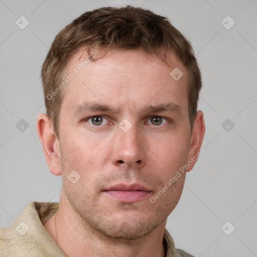 Neutral white adult male with short  brown hair and grey eyes