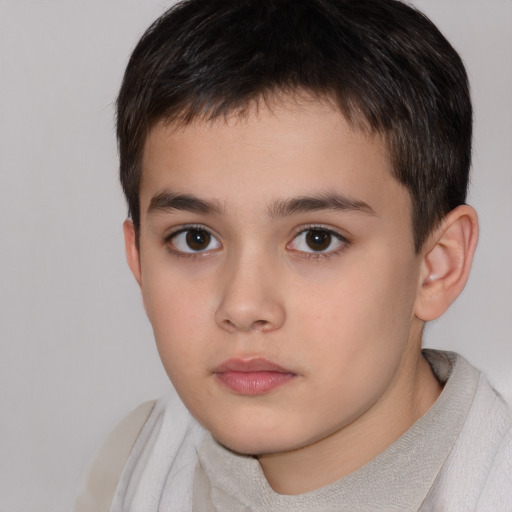 Neutral white child male with short  brown hair and brown eyes