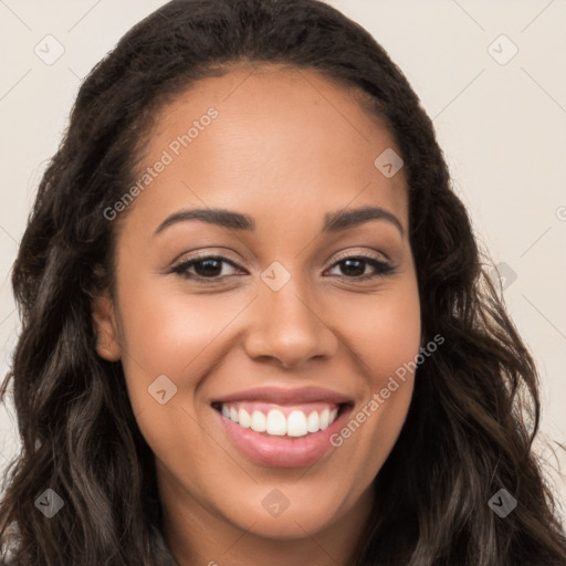 Joyful latino young-adult female with long  brown hair and brown eyes