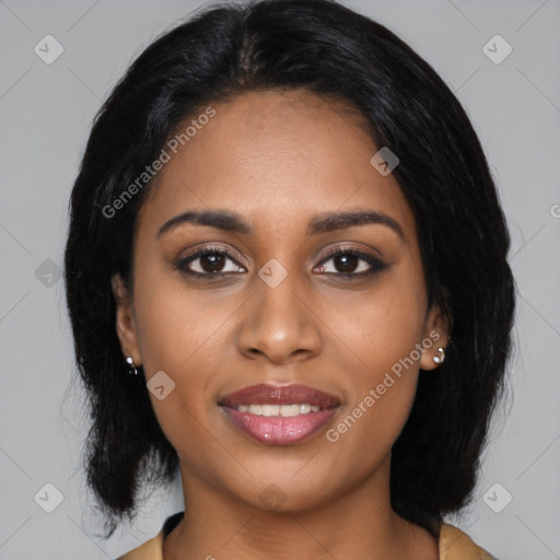 Joyful black young-adult female with medium  black hair and brown eyes