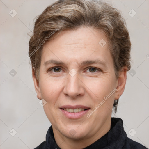 Joyful white adult female with short  brown hair and brown eyes