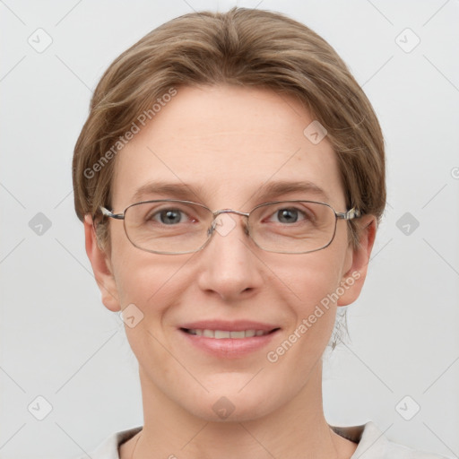 Joyful white adult female with short  brown hair and grey eyes