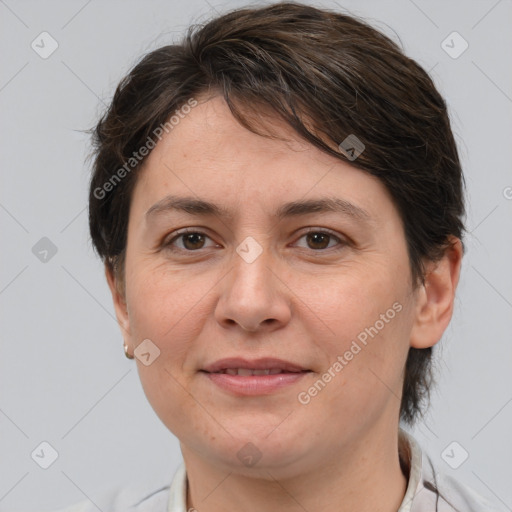 Joyful white adult female with medium  brown hair and brown eyes