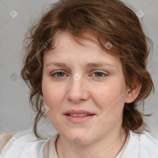 Joyful white young-adult female with medium  brown hair and blue eyes