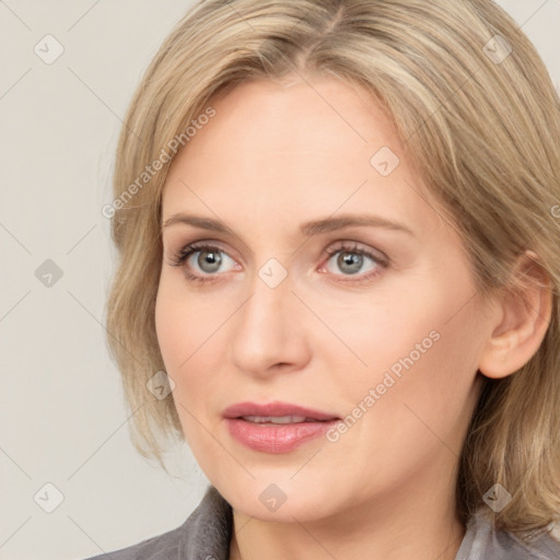 Joyful white young-adult female with medium  brown hair and blue eyes