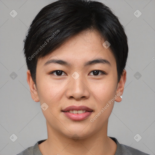 Joyful asian young-adult female with short  black hair and brown eyes