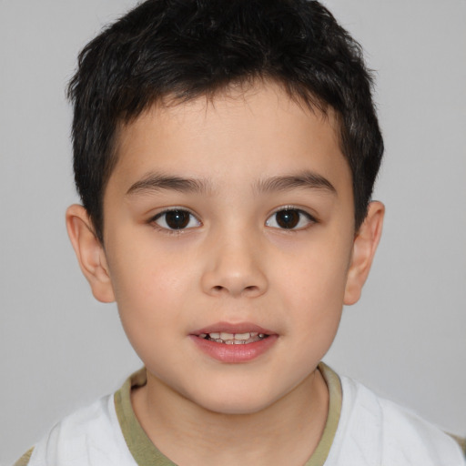 Joyful white child male with short  brown hair and brown eyes