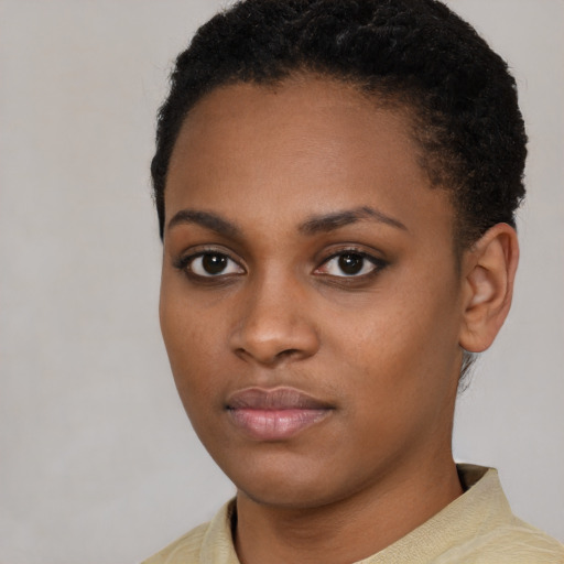 Neutral black young-adult female with short  black hair and brown eyes