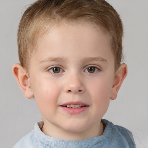 Joyful white child male with short  brown hair and brown eyes