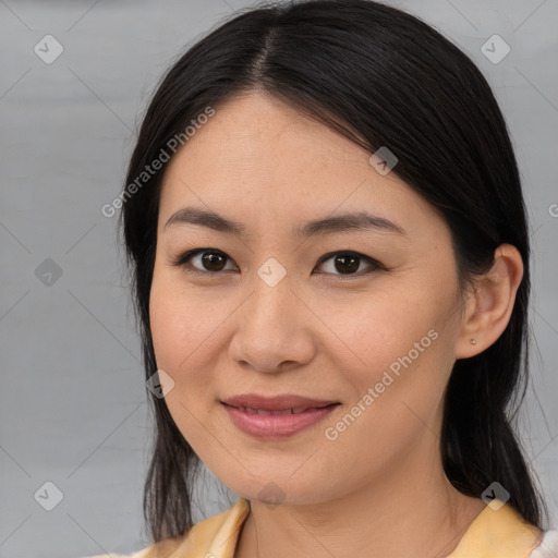 Joyful asian young-adult female with medium  brown hair and brown eyes