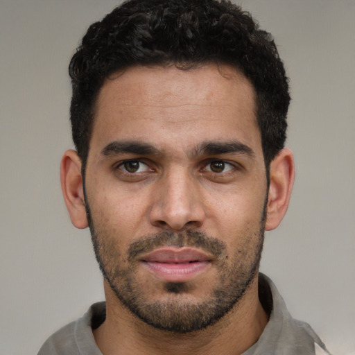 Neutral white young-adult male with short  black hair and brown eyes