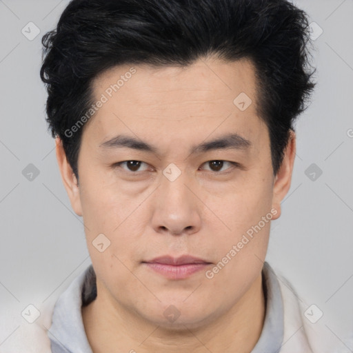 Neutral asian young-adult male with short  brown hair and brown eyes