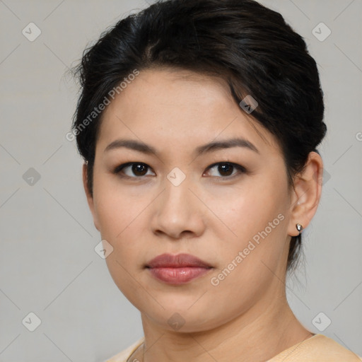 Joyful asian young-adult female with short  brown hair and brown eyes