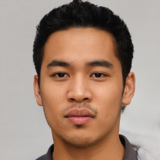 Neutral asian young-adult male with short  black hair and brown eyes