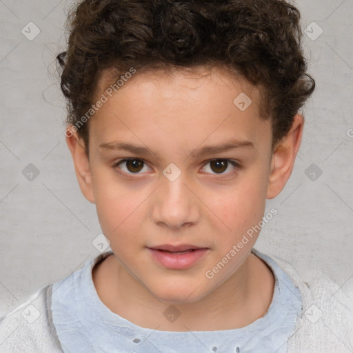 Joyful white child male with short  brown hair and brown eyes