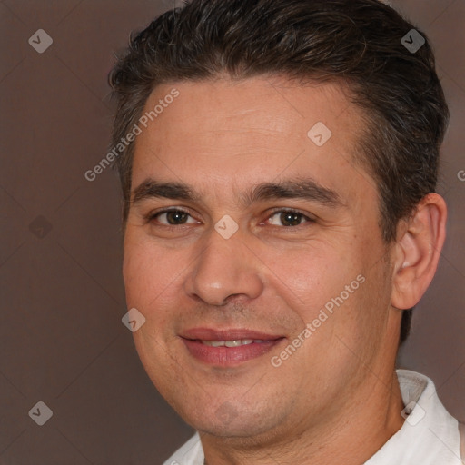 Joyful white adult male with short  brown hair and brown eyes