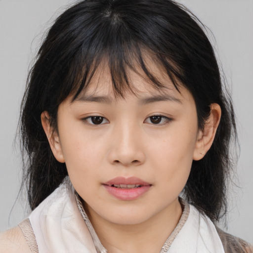 Neutral asian child female with medium  brown hair and brown eyes