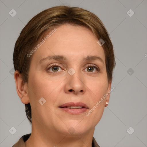 Joyful white adult female with short  brown hair and grey eyes