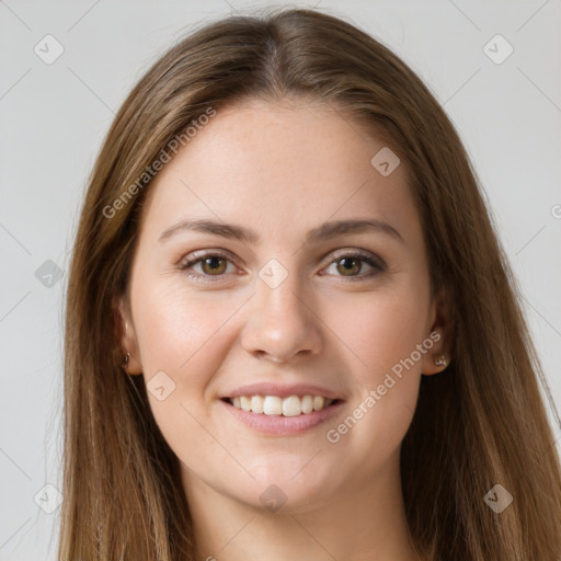 Joyful white young-adult female with long  brown hair and grey eyes