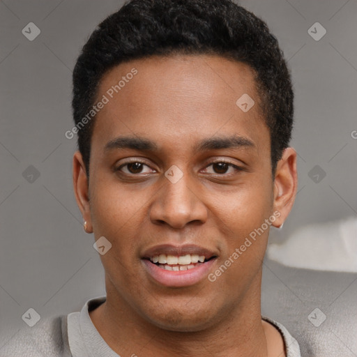 Joyful latino young-adult male with short  brown hair and brown eyes