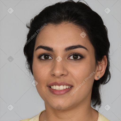 Joyful latino young-adult female with medium  black hair and brown eyes