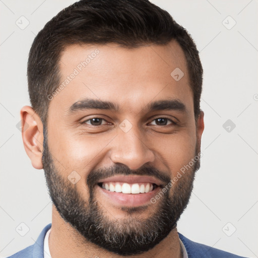 Joyful white young-adult male with short  brown hair and brown eyes