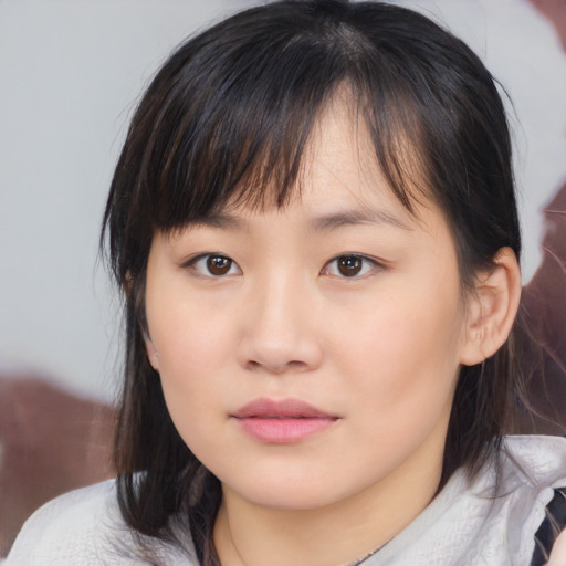 Neutral asian young-adult female with medium  brown hair and brown eyes