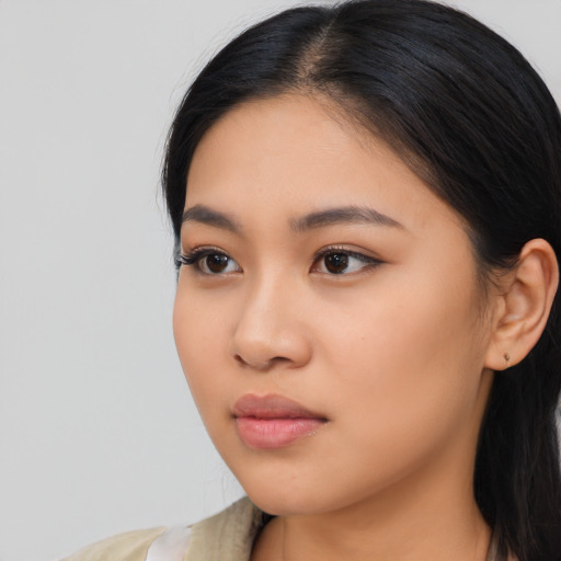 Neutral asian young-adult female with long  black hair and brown eyes