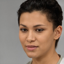 Joyful latino young-adult female with short  brown hair and brown eyes