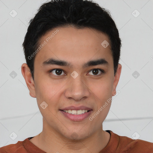 Joyful latino young-adult male with short  brown hair and brown eyes