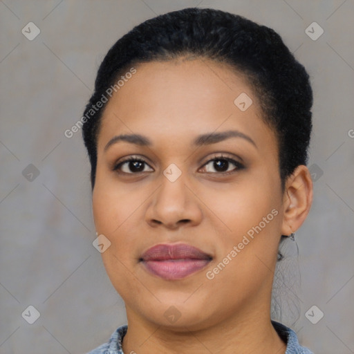 Joyful latino young-adult female with short  black hair and brown eyes