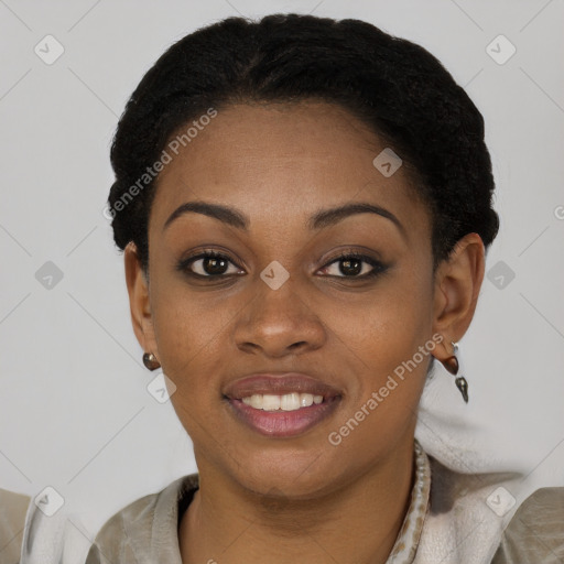 Joyful black young-adult female with short  black hair and brown eyes